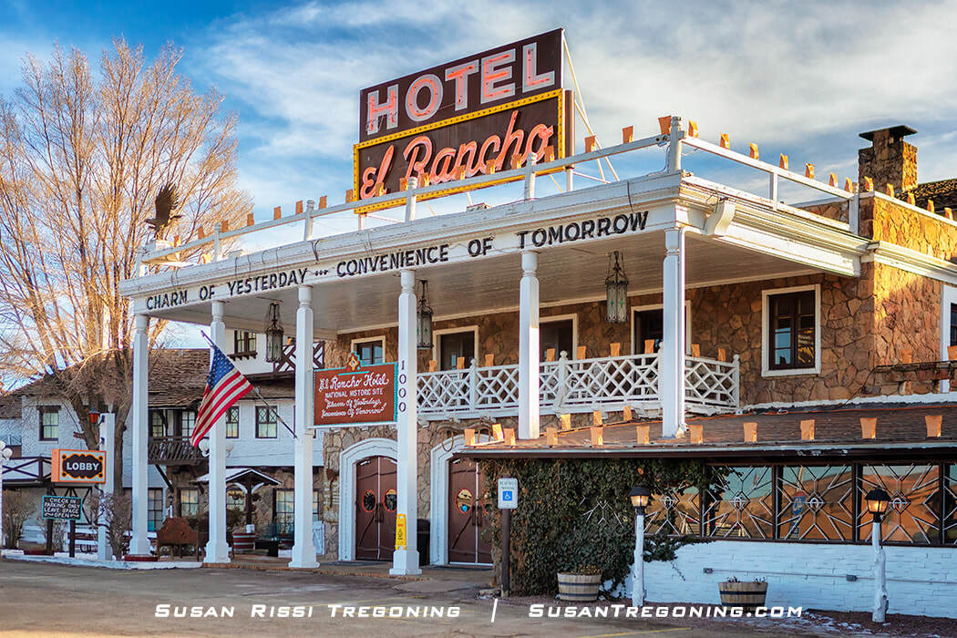 The building has a façade with tall columns supporting a second‑floor portico, giving it a symmetrical, classical appearance. The structure resembles Southern plantation‑style architecture.