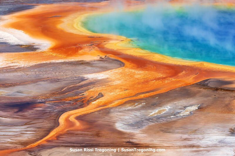 The Grand Prismatic Overlook at Yellowstone National Park for awe-inspiring vistas of the majestic Grand Prismatic Spring—a feast for your eyes!