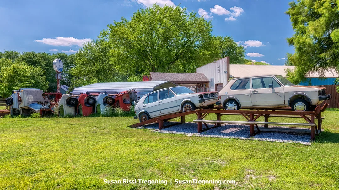Volkswagen Rabbits are positioned nose‑down at Henry’s Rabbit Ranch in Staunton, Illinois. The display is designed as a tribute to the Texas Cadillac Ranch, using VW Rabbits instead of Cadillacs. 
