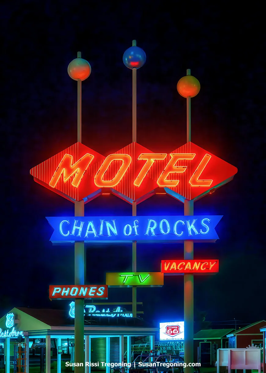 Recreated neon sign representing the mid‑1950s Chain of Rocks Motel, displayed at the Route 66 Experience in Springfield.