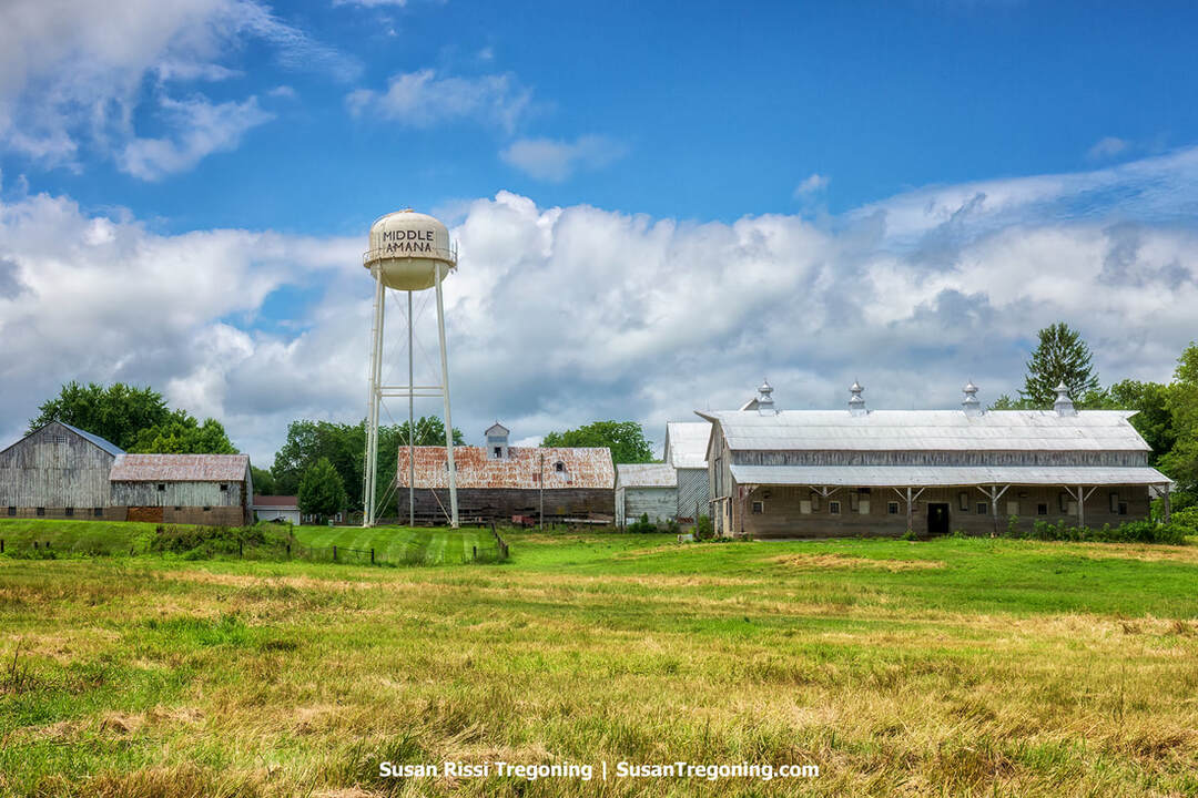 Nestled among a cluster of historic barns, the Middle Amana Water Tower rises within the village of Middle Amana, one of Iowa’s Amana Colonies.