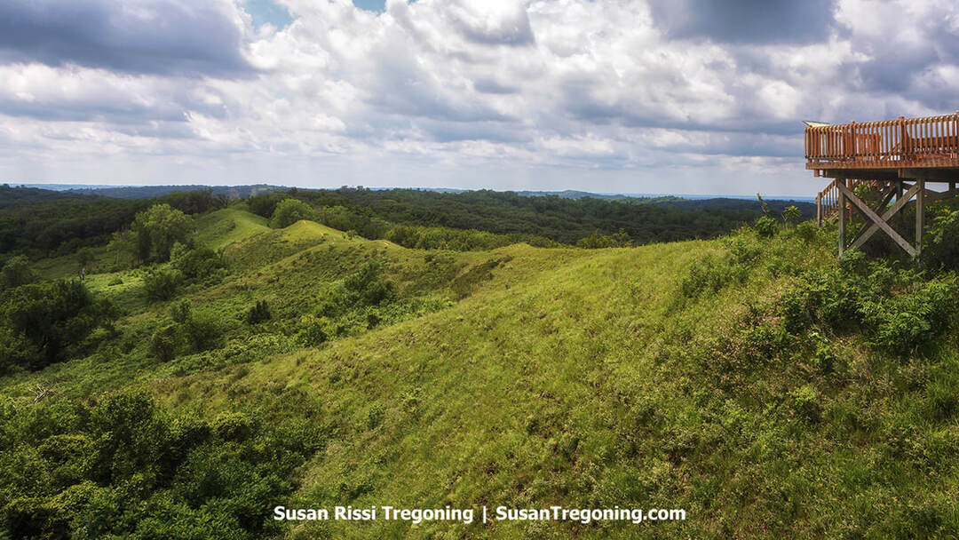 The Spot, a designated overlook along the Loess Hills National Scenic Byway, with views of wind‑formed ridges, rolling slopes, and the broad western Iowa countryside extending toward the horizon.