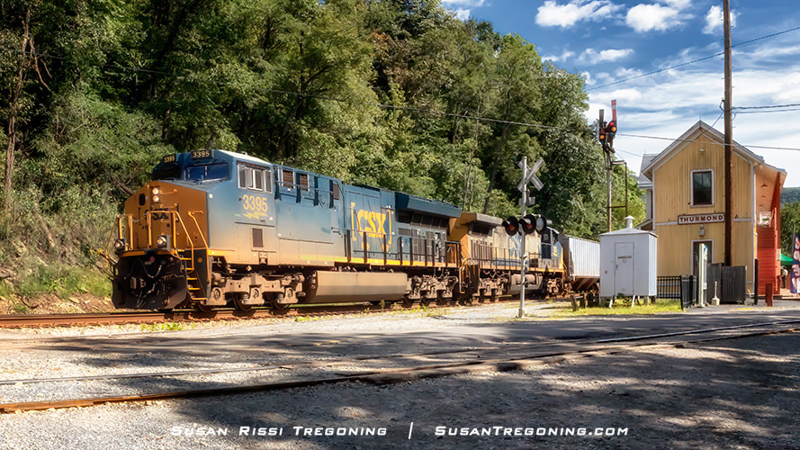 A CSX train passes the Thurmond Train Depot in the rural Appalachian mountain ghost town of Thurmond, West Virginia. 