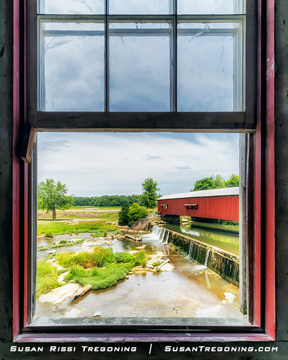 The Bridgeton Covered Bridge as seen from the open window of the historic Bridgeton Mill in Bridgeton, Parke County, Indiana