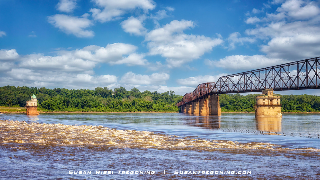 A view from below the Old Chain of Rocks Bridge, of St Louis water intake towers, and the Chain of Rocks shoal from the low water dam on the Mississippi River.