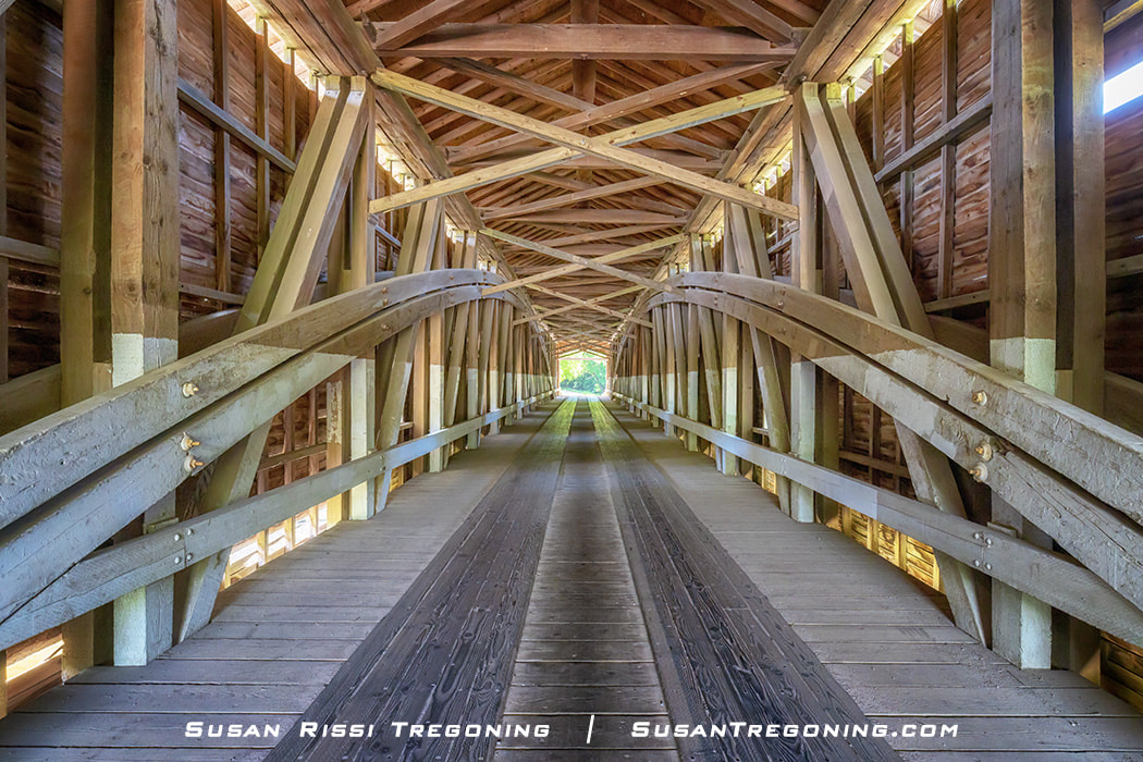  Inside the single-span double Burr Arch Truss double King Post Jackson Covered Bridge in Parke County, Indiana. It is considered the best Covered Bridge of J.J. Daniels career.