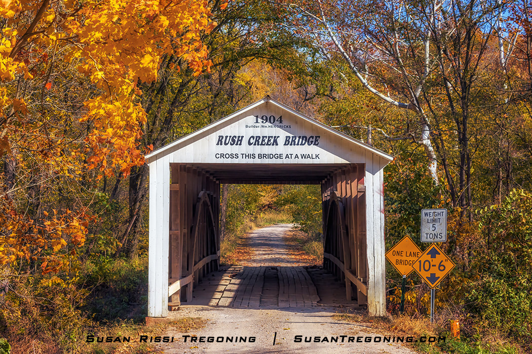 Autumn at Rush Creek Covered Bridge, one of three covered bridges constructed by William Hendricks in Parke County, Indiana. The county with 31 covered bridges is the Covered Bridge Capitol of the United States. 