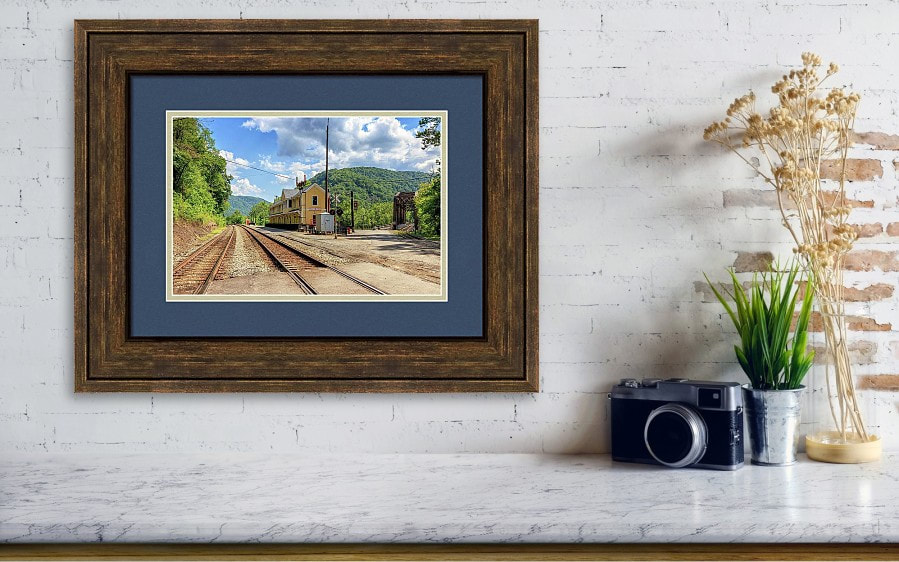 The image, Thurmond Depot and Southside Junction Railroad Bridge, is shown matted and framed.